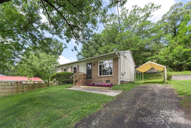 1075 Parkview Dr, Gastonia, NC 28054 - ranch-style house with a detached carport, driveway, brick siding, and crawl space