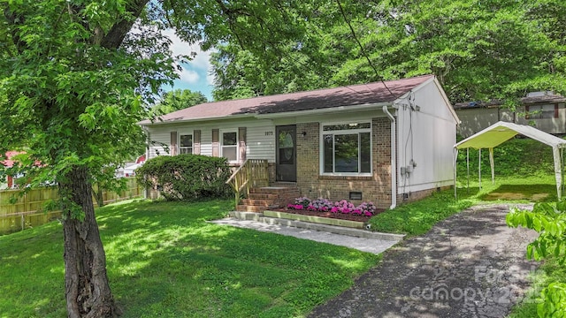1075 Parkview Dr, Gastonia, NC 28054 - view of front of property featuring brick siding, crawl space, and a carport