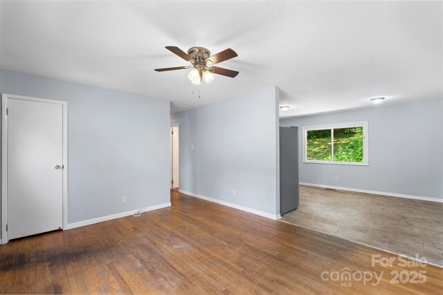 1075 Parkview Dr, Gastonia, NC 28054 - empty room with a ceiling fan, baseboards, and wood finished floors