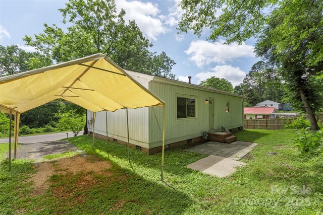 1075 Parkview Dr, Gastonia, NC 28054 - view of outbuilding featuring a carport