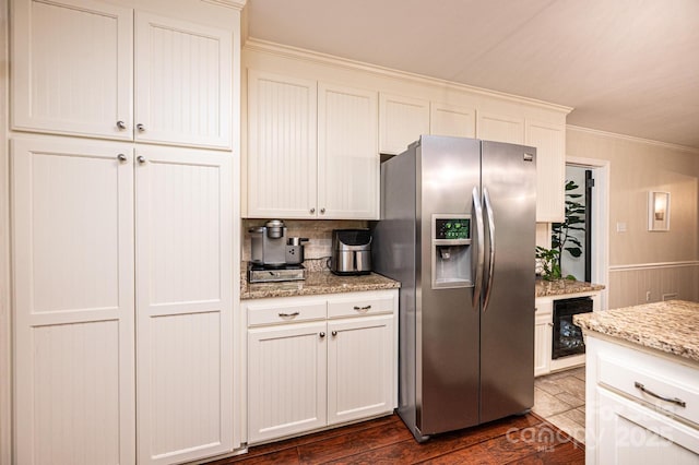 kitchen with stainless steel fridge, wine cooler, crown molding, dark wood-type flooring, and tasteful backsplash