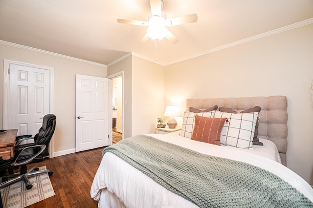 bedroom with dark wood-type flooring, crown molding, a desk, baseboards, and ceiling fan