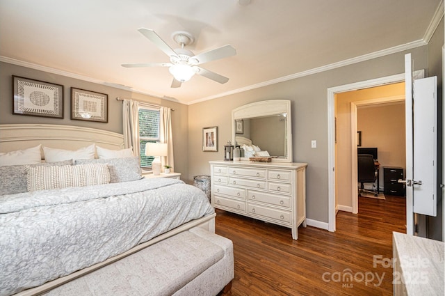 bedroom with ornamental molding, dark wood-type flooring, a desk, baseboards, and a ceiling fan