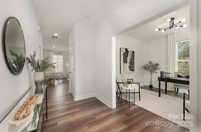 3004 Marlowe Ave, Charlotte, NC 28208 - corridor featuring dark wood finished floors, a chandelier, baseboards, and recessed lighting