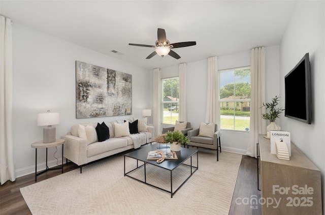 3004 Marlowe Ave, Charlotte, NC 28208 - living area with wood finished floors, a ceiling fan, and baseboards