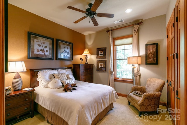 bedroom with light carpet, baseboards, recessed lighting, and a ceiling fan