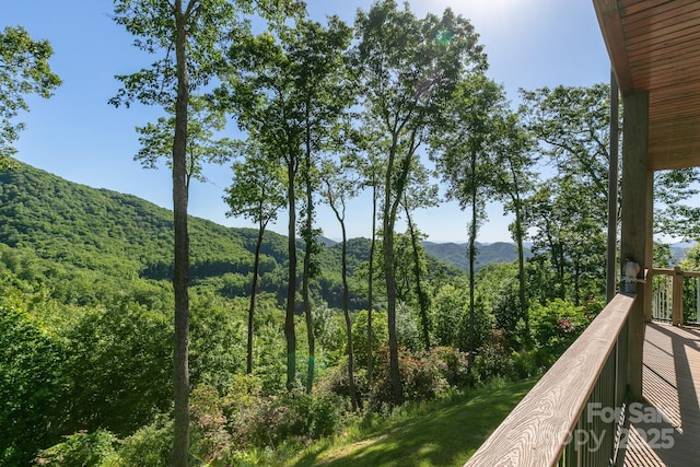 mountain view featuring a heavily wooded area