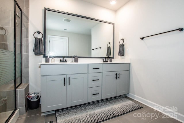 11951 Old Statesville Rd, Huntersville, NC 28078 - full bathroom featuring a shower stall, tile patterned floors, double vanity, and baseboards
