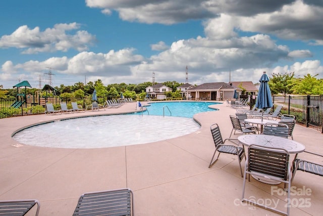 11951 Old Statesville Rd, Huntersville, NC 28078 - community pool featuring a patio area