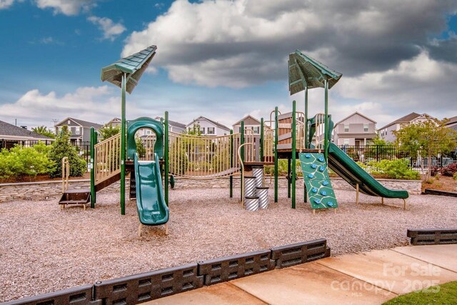 11951 Old Statesville Rd, Huntersville, NC 28078 - community play area featuring a residential view