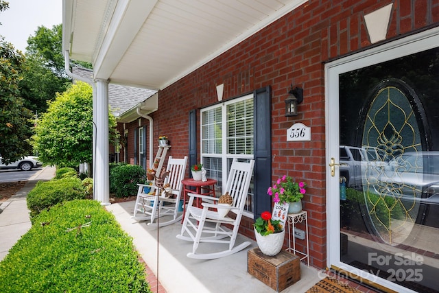 556 Knighton Hill Rd, Rock Hill, SC 29732 - doorway to property featuring a porch and brick siding