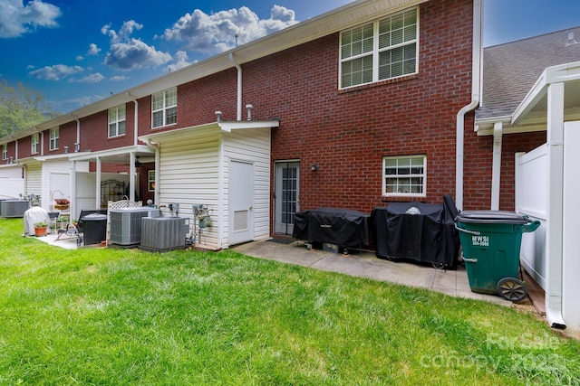556 Knighton Hill Rd, Rock Hill, SC 29732 - back of house with a patio, central AC, a yard, and brick siding