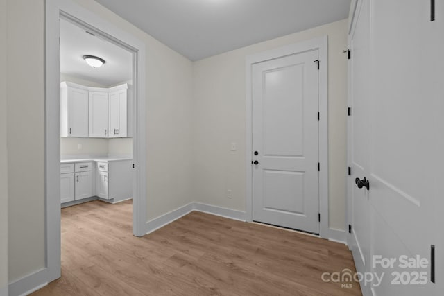 4975 Rimer Rd Unit 1, Concord, NC 28025 - foyer entrance featuring light wood finished floors and baseboards