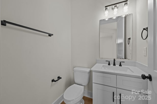 4975 Rimer Rd Unit 1, Concord, NC 28025 - half bathroom featuring toilet and vanity