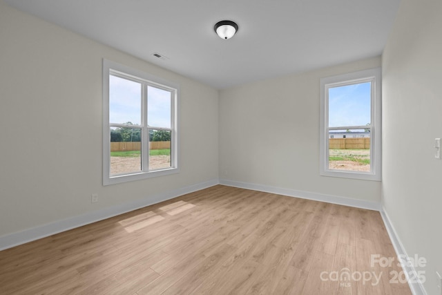 4975 Rimer Rd Unit 1, Concord, NC 28025 - empty room with light wood-type flooring and plenty of natural light