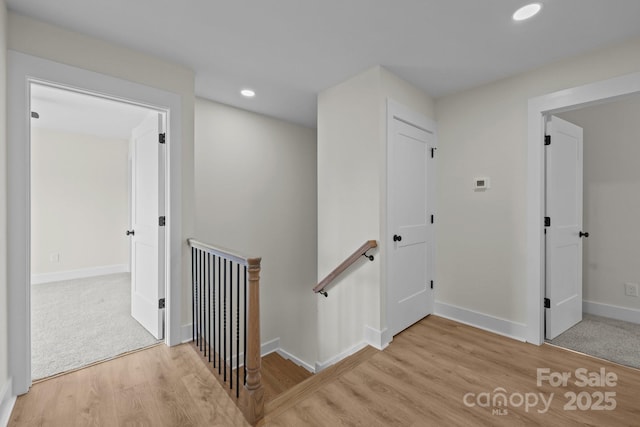 4975 Rimer Rd Unit 1, Concord, NC 28025 - hallway with an upstairs landing, light wood-style floors, and recessed lighting