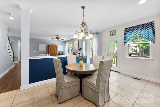 6300 Latta Springs Cir, Huntersville, NC 28078 - dining room with light tile patterned flooring, baseboards, a chandelier, a ceiling fan, and recessed lighting