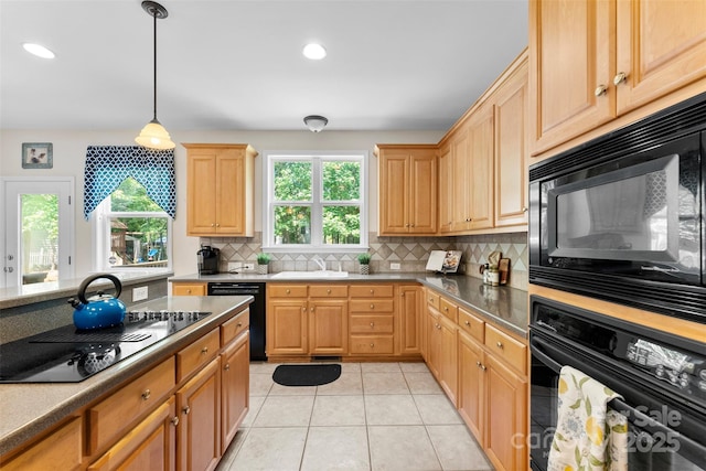 6300 Latta Springs Cir, Huntersville, NC 28078 - kitchen with black appliances, a sink, backsplash, healthy amount of natural light, and recessed lighting