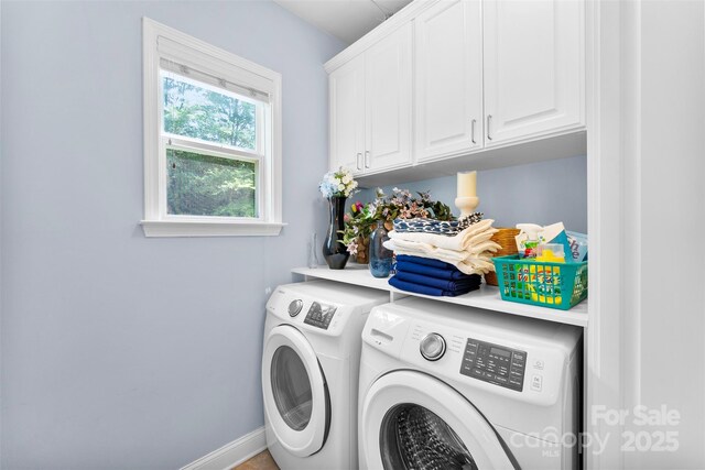 6300 Latta Springs Cir, Huntersville, NC 28078 - laundry area with cabinet space, separate washer and dryer, and baseboards