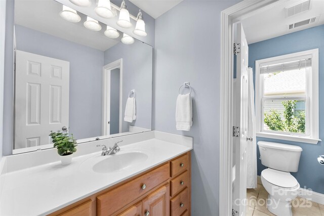 6300 Latta Springs Cir, Huntersville, NC 28078 - bathroom featuring vanity, toilet, tile patterned flooring, and baseboards