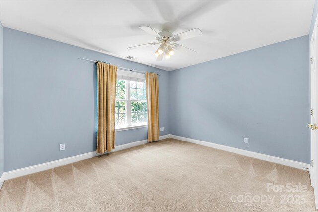 6300 Latta Springs Cir, Huntersville, NC 28078 - unfurnished room with baseboards, ceiling fan, and carpet