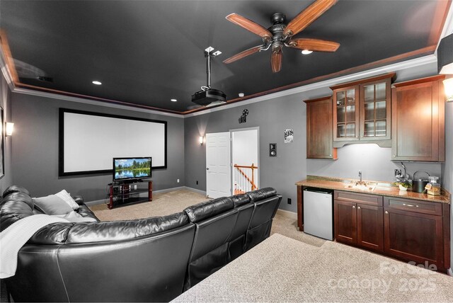 6300 Latta Springs Cir, Huntersville, NC 28078 - cinema featuring a sink, ornamental molding, light carpet, a ceiling fan, and baseboards