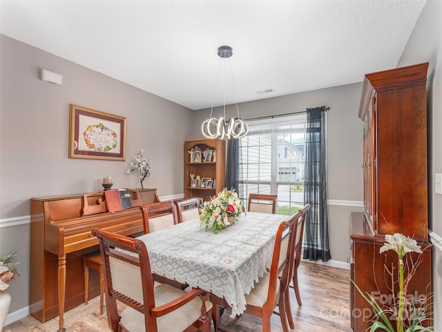 379 Running Briar Rd, Fletcher, NC 28732 - dining room with baseboards and light wood-style floors