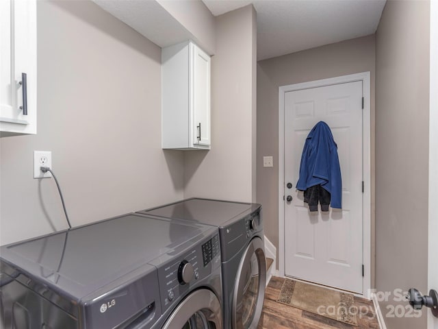 379 Running Briar Rd, Fletcher, NC 28732 - laundry room with cabinet space, separate washer and dryer, and baseboards
