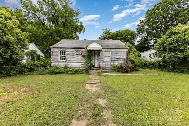 2308 Vanderbilt Rd, Charlotte, NC 28206 - view of front of property featuring a front lawn and a chimney
