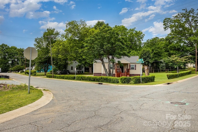 2308 Vanderbilt Rd, Charlotte, NC 28206 - view of asphalt street featuring traffic signs and curbs