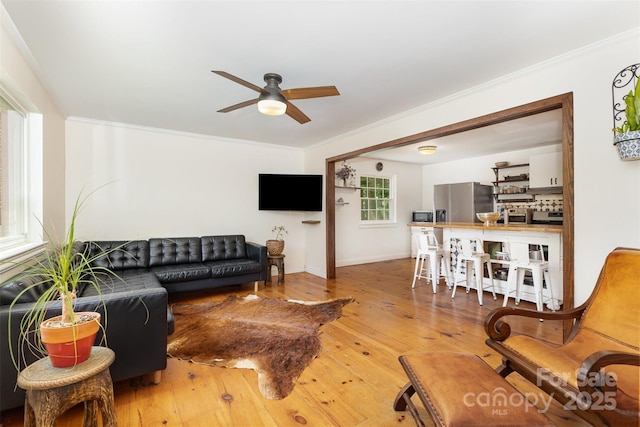 7015 Lavern St, Charlotte, NC 28215 - living area with a ceiling fan, hardwood / wood-style floors, and ornamental molding