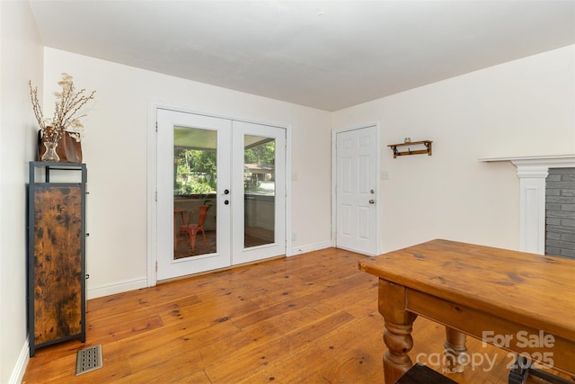 7015 Lavern St, Charlotte, NC 28215 - entryway with french doors and wood-type flooring