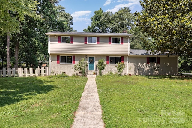 7015 Lavern St, Charlotte, NC 28215 - colonial inspired home with a chimney and brick siding