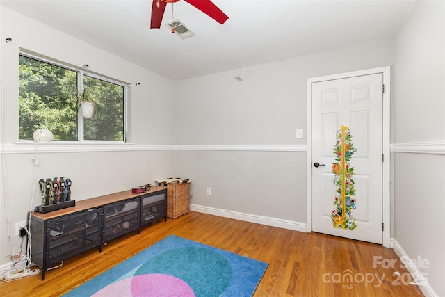 7015 Lavern St, Charlotte, NC 28215 - rec room featuring a ceiling fan and wood finished floors
