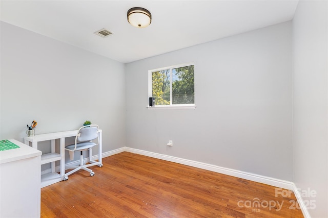 7015 Lavern St, Charlotte, NC 28215 - unfurnished room featuring baseboards and wood finished floors