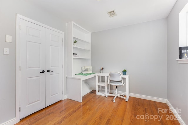 7015 Lavern St, Charlotte, NC 28215 - office with light wood-type flooring and baseboards