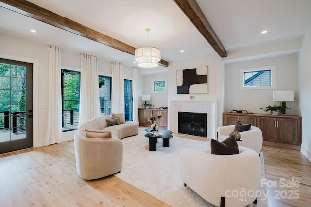 1625 Club Rd, Charlotte, NC 28205 - living area with beam ceiling, light wood-style floors, a tile fireplace, and recessed lighting