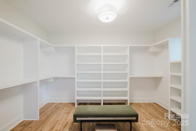 1625 Club Rd, Charlotte, NC 28205 - spacious closet featuring wood finished floors
