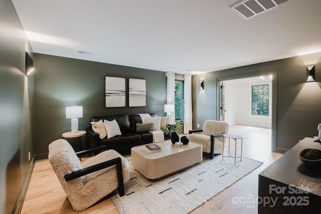 1625 Club Rd, Charlotte, NC 28205 - living area featuring light wood-type flooring