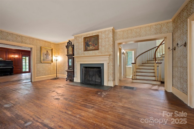 93 Villa Barbara Ln, Tryon, NC 28782 - unfurnished living room featuring wallpapered walls, wood finished floors, stairway, a fireplace, and crown molding