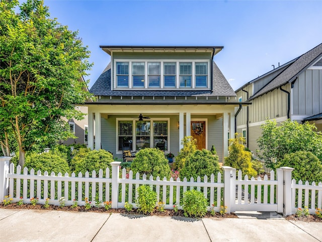 294 W Main St, Brevard, NC 28712 - bungalow-style house with a porch, a fenced front yard, and ceiling fan
