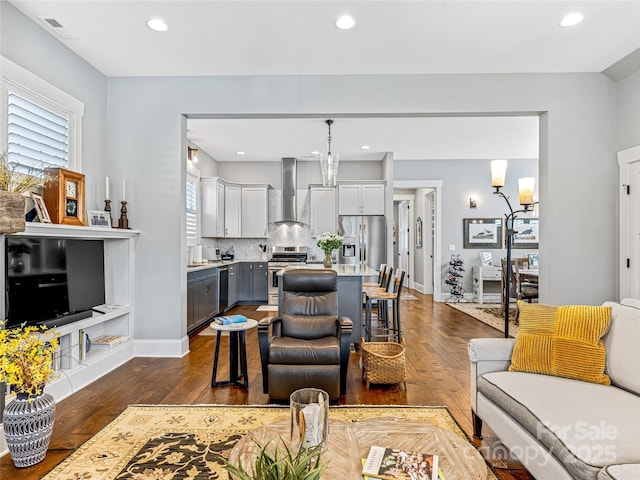 294 W Main St, Brevard, NC 28712 - living room featuring dark wood-style flooring, healthy amount of natural light, recessed lighting, and baseboards
