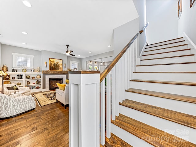 294 W Main St, Brevard, NC 28712 - staircase featuring a ceiling fan, wood finished floors, recessed lighting, healthy amount of natural light, and a fireplace