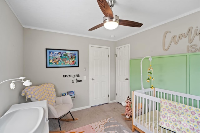 2021 Beamguard Rd, Clover, SC 29710 - bedroom featuring a crib, carpet, crown molding, baseboards, and ceiling fan