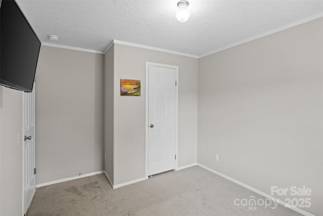 2021 Beamguard Rd, Clover, SC 29710 - unfurnished bedroom featuring baseboards, carpet floors, and a textured ceiling