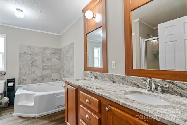 2021 Beamguard Rd, Clover, SC 29710 - full bath featuring wood finished floors, a bath, a shower stall, double vanity, and toilet