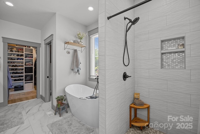 187 Olde Cobblestone Dr, Bostic, NC 28018 - full bath with a freestanding tub, a spacious closet, a tile shower, marble finish floors, and recessed lighting