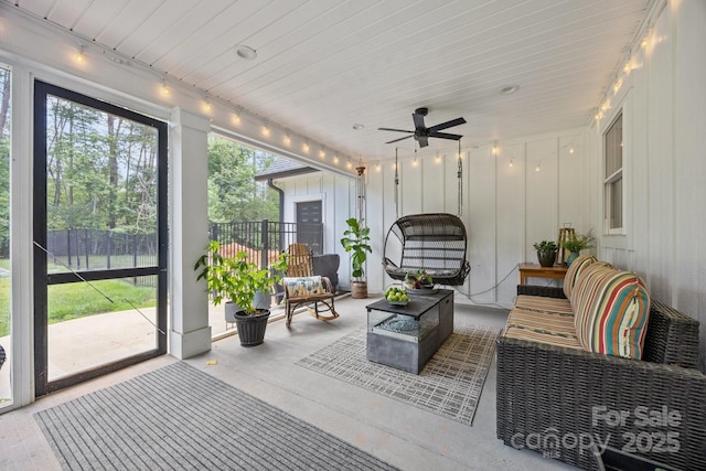 187 Olde Cobblestone Dr, Bostic, NC 28018 - sunroom featuring rail lighting, a ceiling fan, and outdoor lounge area