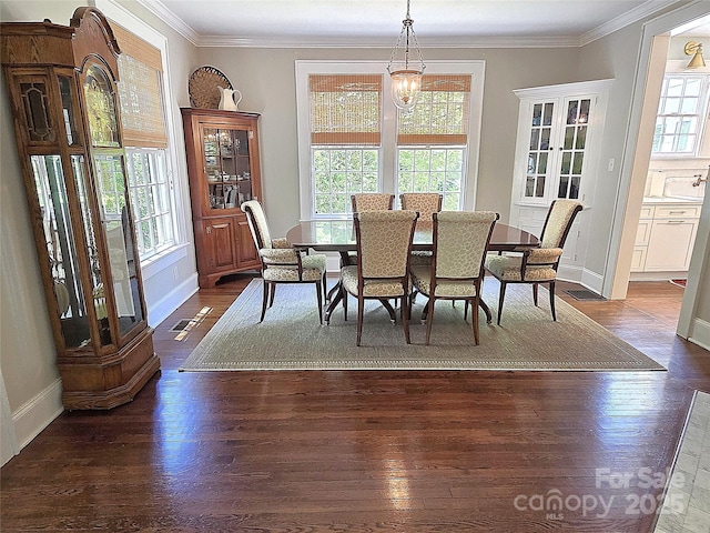 1051 14th Avenue Dr NW, Hickory, NC 28601 - dining space with ornamental molding, dark wood-style flooring, and baseboards