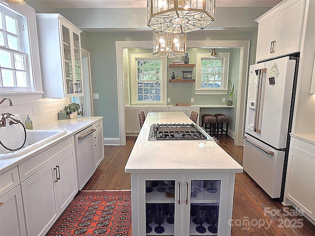 1051 14th Avenue Dr NW, Hickory, NC 28601 - kitchen featuring appliances with stainless steel finishes, white cabinets, a sink, and dark wood-style flooring